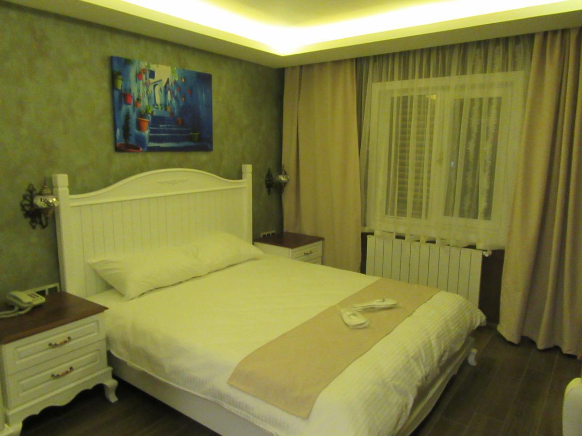 Trilye Kaplan Hotel Мудания Екстериор снимка